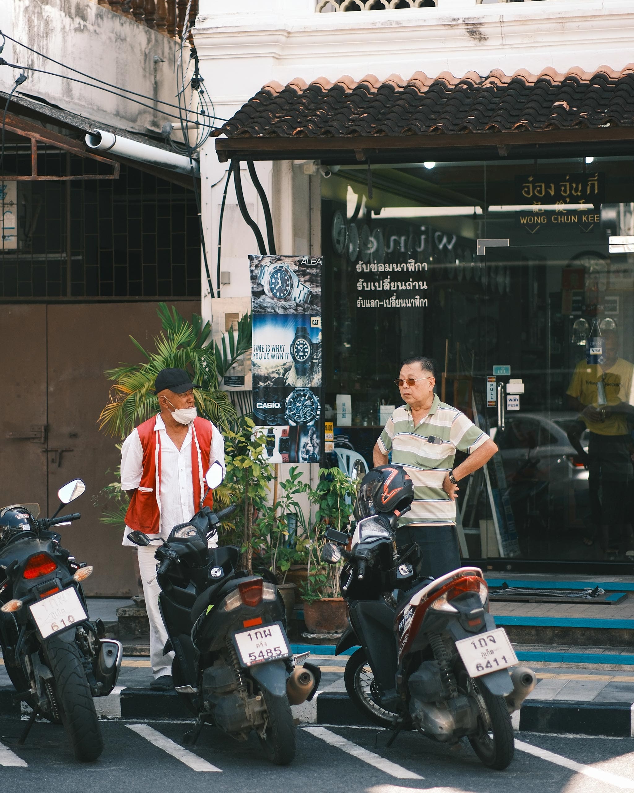 people in front of a coffee shop