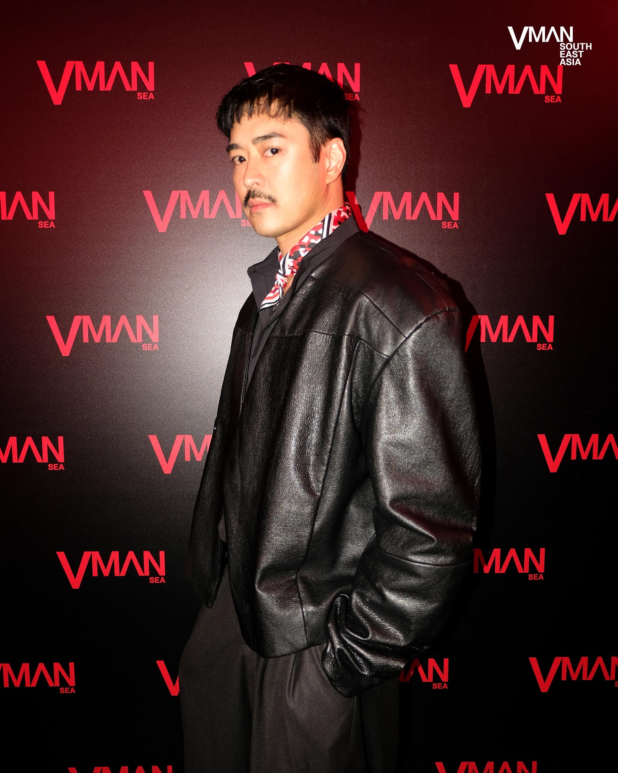 Brent Javier wearing a leather jacket