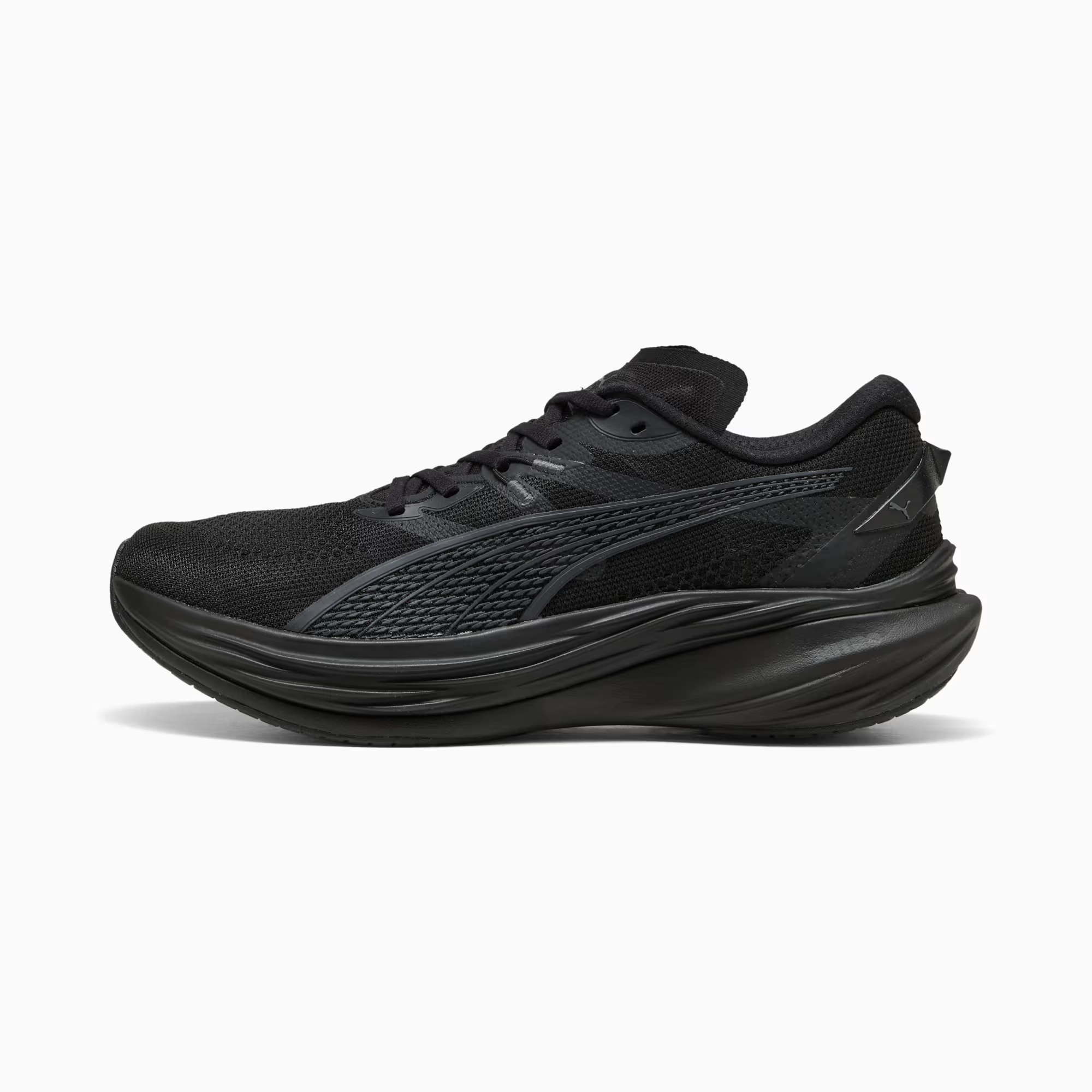 Close-up side view of a black running shoe with a thick textured sole and mesh upper