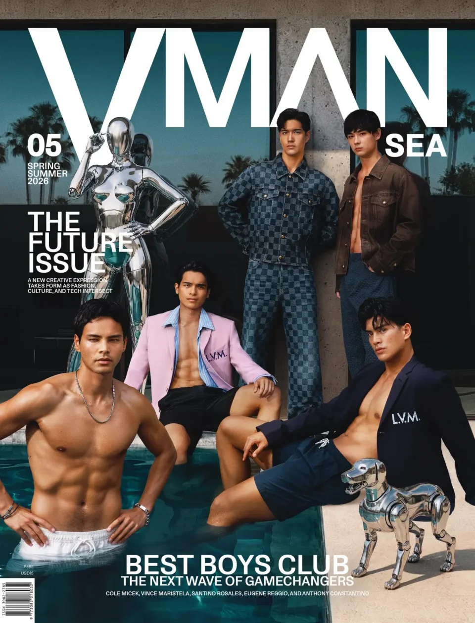 Magazine cover with male models posing by a pool beside a chrome robot statue and the bold VMAN title in the background, Spring/Summer 2026.
