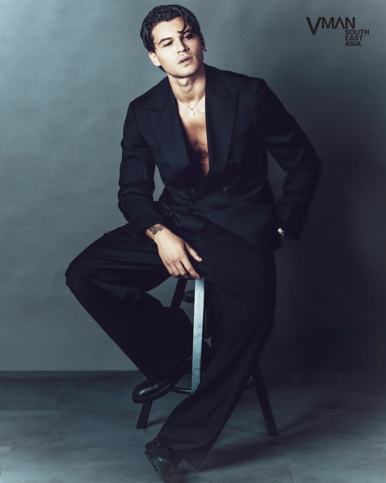 antonio medugno wearing boss suit